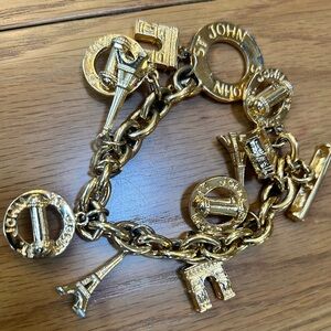 St. John iconic vintage Paris Gold plated Charm Bracelet heavy so cute
